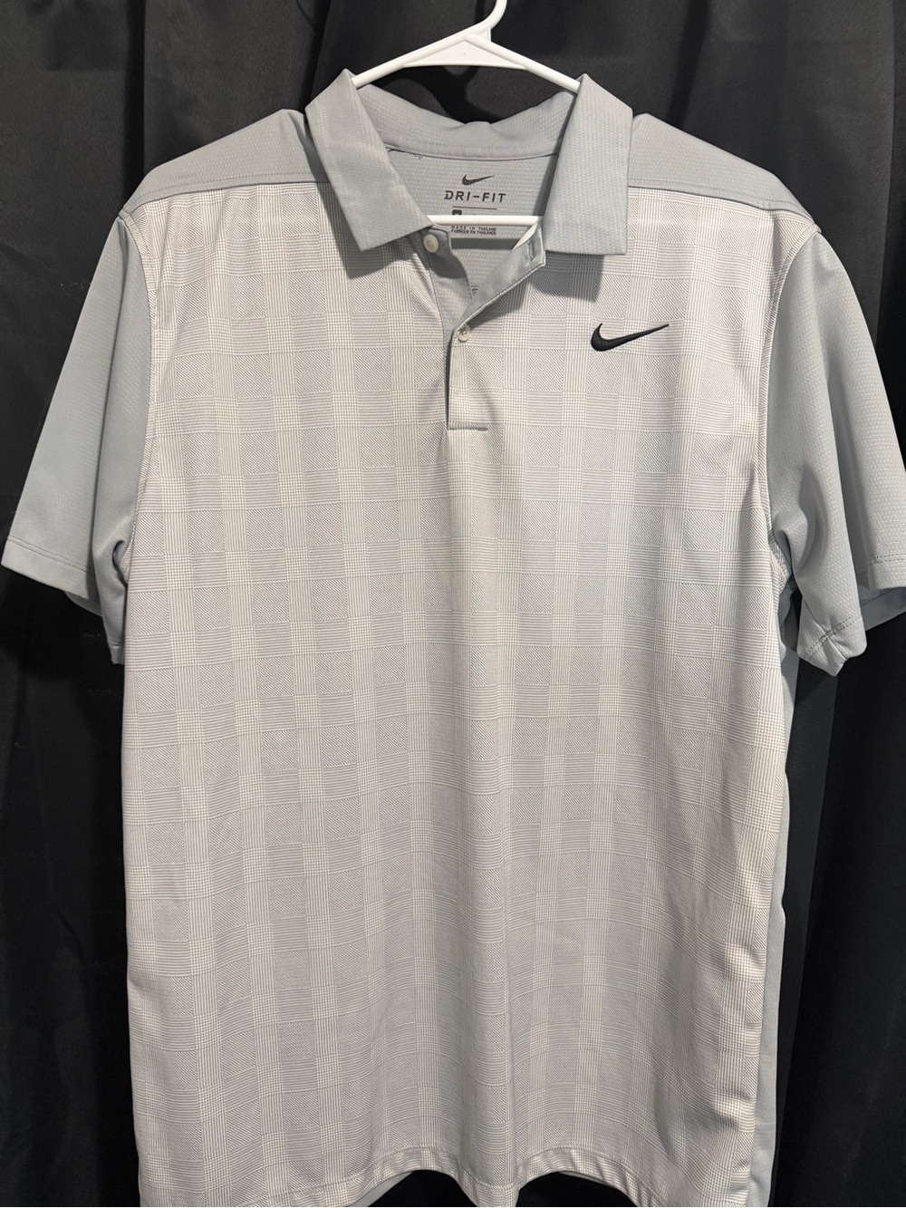 Nike Men's Light Gray Dri-FIT Polo Shirt with Black Swoosh